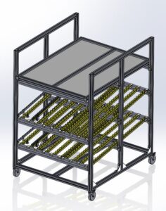 A 3D model of an industrial storage cart with a gray top shelf and lower angled racks. It has a metal frame and caster wheels, suggesting mobility. FlexMation Hybrid Work Station Flow Rack