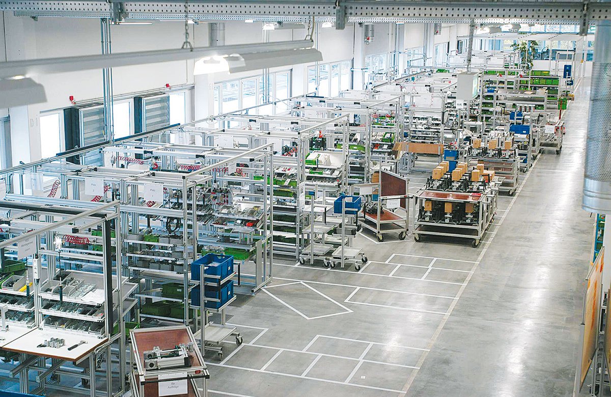 large clean working warehouse has many carts and moveable options